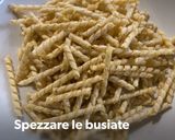 Foto del passaggio 3 della ricetta Busiate con tenerumi, zucca e fiori