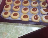 Foto del paso 5 de la receta: Pepas con dulce de leche y baño de chocolate