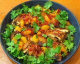A picture of step 11 of Blackened chicken with caramel and clementine dressing.