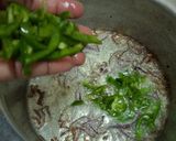A picture of step 2 of Spicy lentils (kamande)in milk and cinnamon raisins chapati.
