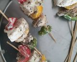 A picture of step 6 of Grilled Paneer mushrooms on Satay sticks.