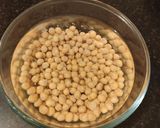 A picture of step 1 of Ghugni -(Bengali style Yellow peas curry).