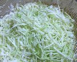 A picture of step 7 of Celery and minced meat stir fry served with rice.