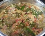 A picture of step 5 of Vegetable Daliya khichdi.