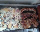 Foto del paso 3 de la receta: Tira banderita al chimi con batatas y papas, a la plancheta