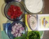 A picture of step 2 of Smoked onion and tomato raita with ciba raita masala.