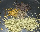 A picture of step 3 of Green chilli pickle.