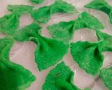 A picture of step 17 of Homemade farfalle pasta in three colour.