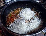 Foto del paso 7 de la receta: Arroz con pechuga de pollo a los tres currys