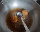 A picture of step 2 of Jhatpat khata meetha amla.