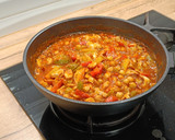 Foto del paso 5 de la receta: Wok de pulpo con garbanzos tres pimientos
