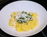 A picture of step 5 of Cacio e pepe Spaghetti Squash with chive pesto.