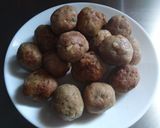 A picture of step 7 of Grandma's Meatballs - with Tomato Oregano Sauce.
