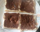 A picture of step 2 of Nutella banana Swiss rolls.
