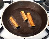 Foto del passaggio 9 della ricetta Fiori di zucca ripieni alla feta, melanzane e menta