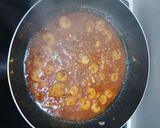 Foto del paso 7 de la receta: Merluza en salsa con gambitas