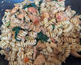A picture of step 5 of Creamy Garlic Chicken Pasta with Tomato Spinach & Mushrooms.