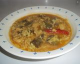 Foto del paso 15 de la receta: Arroz caldoso de calamares y alcachofas