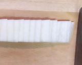 A picture of step 5 of Kouhaku Namasu (Daikon and carrot pickles).