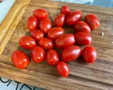 Une image de l'étape 10 de Rouelle marinée de porc aux tomates cerises et herbes aromatiques.