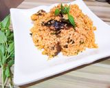 A picture of step 6 of Palm oil rice native jollof rice.