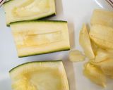 A picture of step 1 of Zucchini stuffed with cheesy Guacamole.