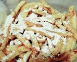 A picture of step 3 of Masala French fries.