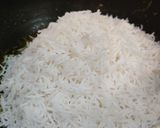A picture of step 9 of SPINACH RICE with PEAS..