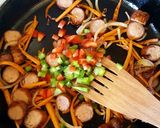 A picture of step 4 of Sausage Carrots Mixed Pepper stir fry.