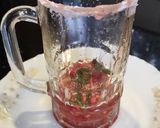 A picture of step 2 of Strawberry pomegranate Mojito.