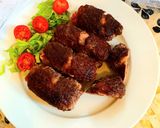 A picture of step 6 of Beef rolls in the oven.
