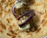 A picture of step 5 of Chicken paratha roll.