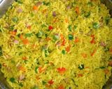 A picture of step 8 of Turmeric fried rice and fried chicken.