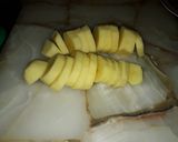 Foto del paso 3 de la receta: Milanesa napolitana con papas al horno