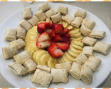 Foto del paso 2 de la receta: Desayuno saludable: Banana, frutillas, cereales y miel