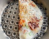 A picture of step 4 of Bánh Xèo with Shrimp and Squid.