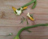 Foto del passaggio 2 della ricetta Fiori di zucca ripieni e impanati in friggitrice ad aria