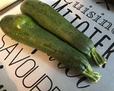 Une image de l'étape 2 de Courgettes et aubergines au soja et sésame (avec piments verts grillés).