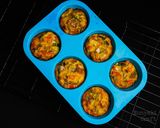 A picture of step 7 of Egg Omelette Muffins #bakingforkids.
