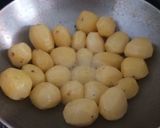 A picture of step 2 of Aloo Dum Biriyani.