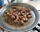 A picture of step 1 of Pork Rib and Cauliflower Paella.