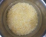 A picture of step 1 of Hesarubele Bili Saru/Moong dal tomato rasam.