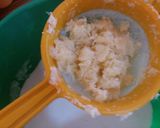 A picture of step 2 of Orange milkshake.