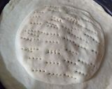 A picture of step 11 of Aloo kabab naan without oven serve with raita.