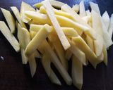 Foto del paso 4 de la receta: Pollo al horno con papas fritas
