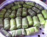 A picture of step 6 of Khao Tom Mud (Thai Sticky Rice Banana Parcels).