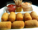 Foto del paso 9 de la receta: Aperitivo de salchichas rellenas con queso, rebozadas