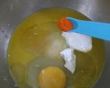 A picture of step 1 of 4 in 1 orange mousse sponge cake.