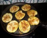 A picture of step 3 of Baigan bhaja.