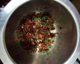A picture of step 2 of Chicken pilau.